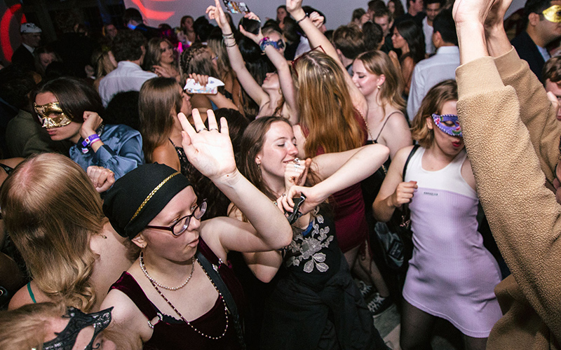 students at a guild nighttime event